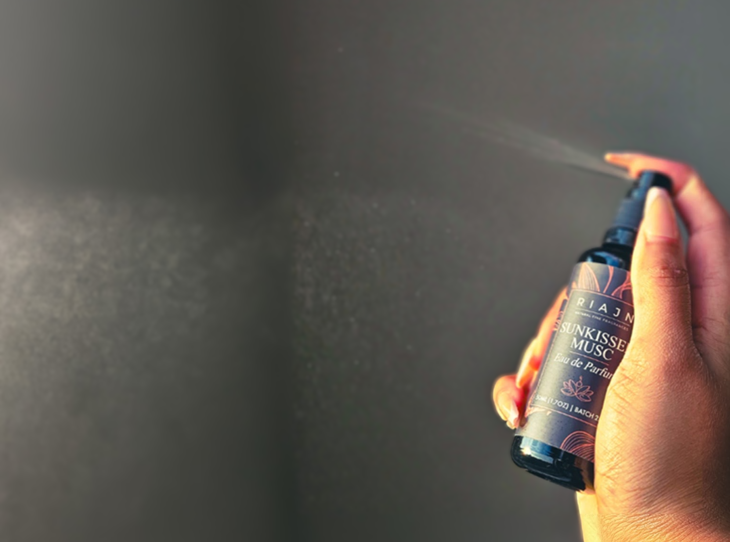 A couple dancing in front of a blue, purple, yellow, and orange gradient sunset next to palm trees on the beach.