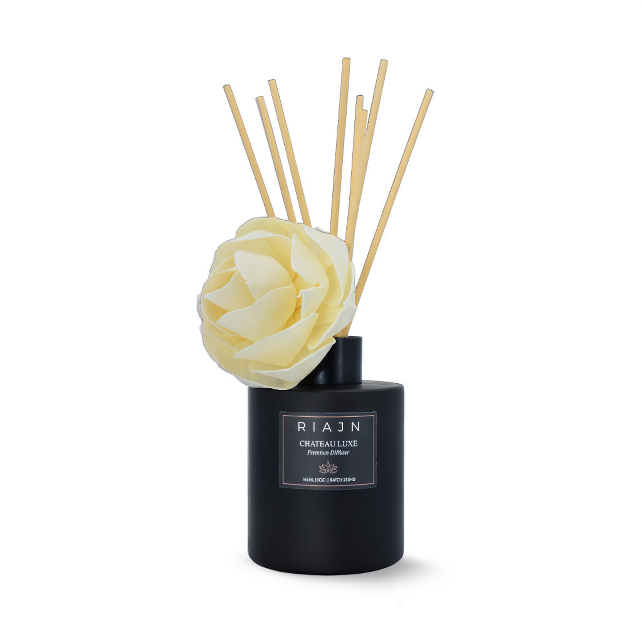 RIAJN matte black diffuser bottle with neutral reed sticks and cream flower reed sticking out of the bottle with a white background.