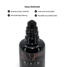 Black glass rollerball bottle with RIAJN branding on a white background with glass bottle features.
