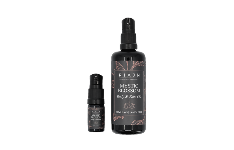 Two bottles of Riaan Mystic Blossom Body & Face Oil on a white background