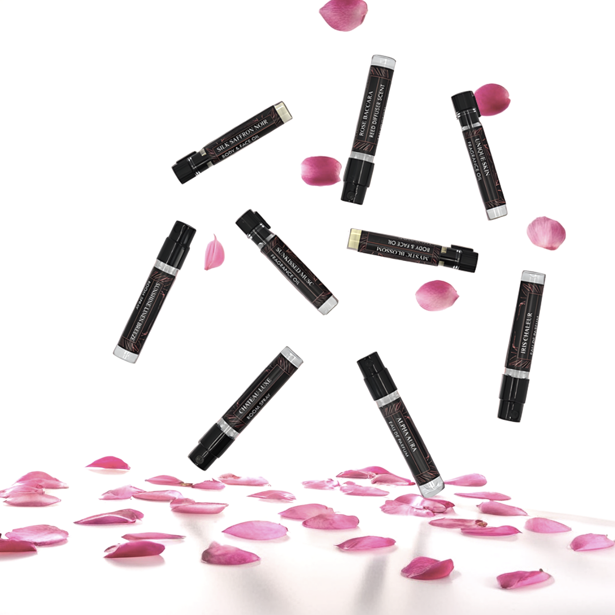 Nine black 1 mL sample vials on a white background with pink rose petals falling from the sky and on the ground.