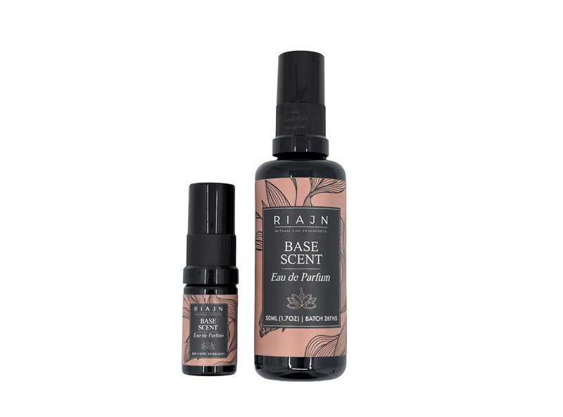 Two RIAJN smellmaxxing base scent eau de perfum bottles on a white background