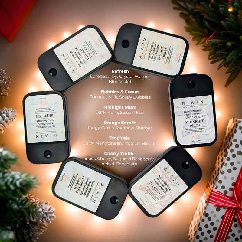 Set of RIAAN plant-powered hand sanitizers with labels on a decorative background.